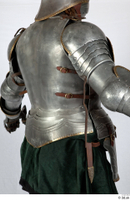  Photos Medieval Knight in plate armor 9 Green Gambeson Historical Medieval soldier plate armor upper body 0007.jpg